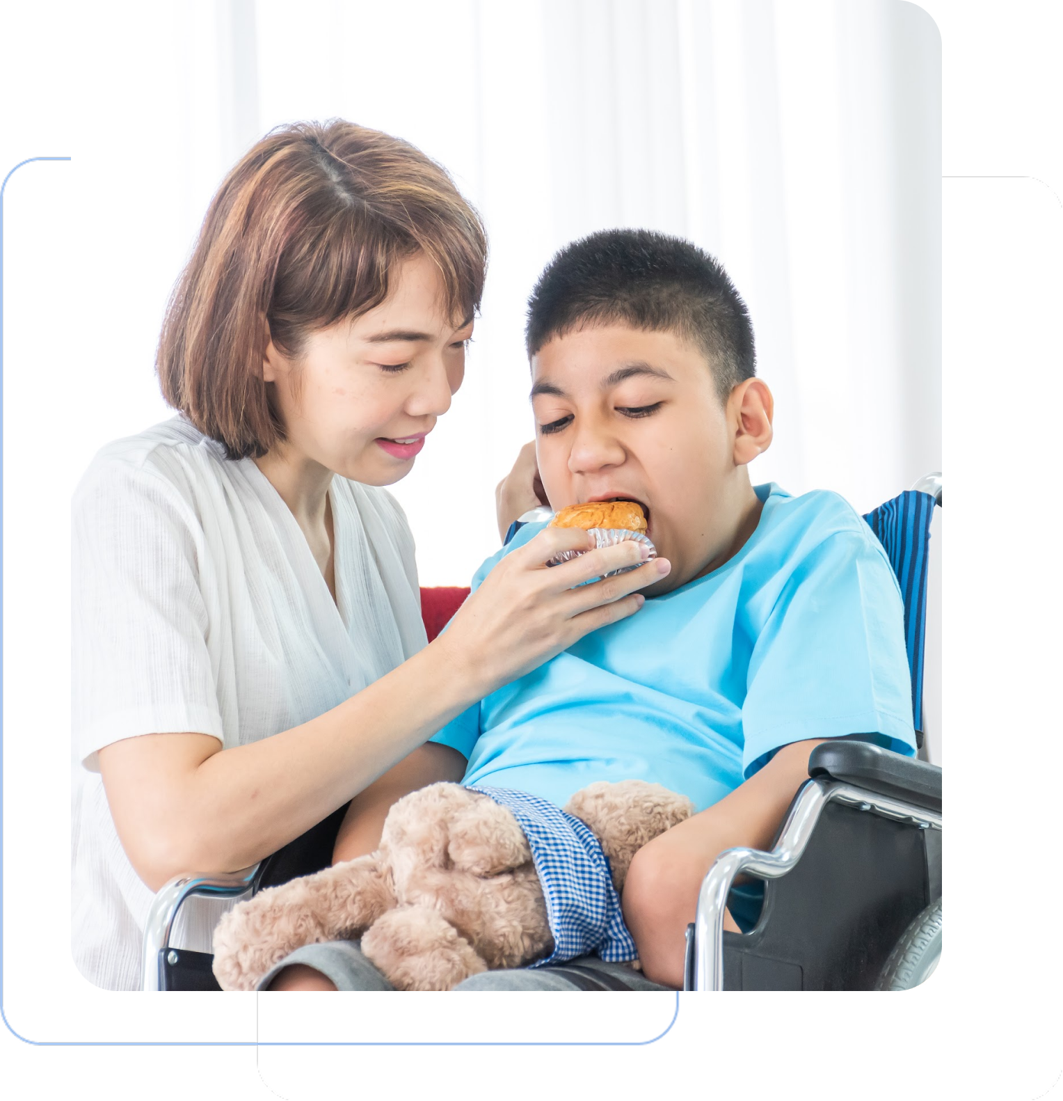 Group 1321314630 A woman feeding a boy