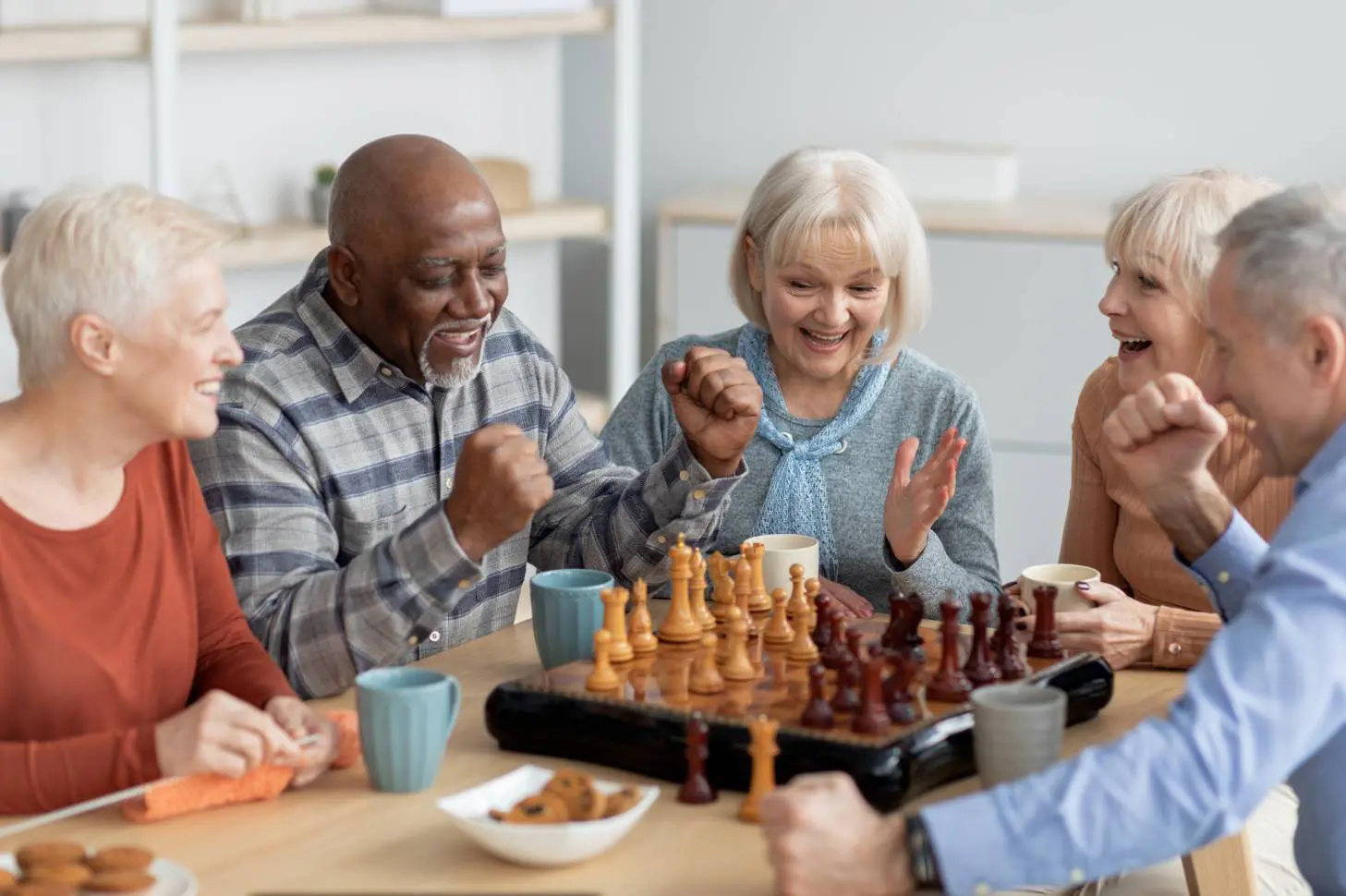 Old persons are playing together